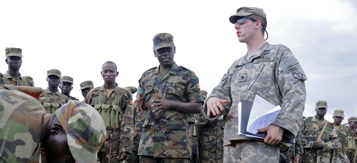 A soldier with the Georgia National Guard practice establishing drop zones with the Ugandan People's Defense Forces during an exercise sponsored by U.S. Army Africa. A soldier with the Georgia National Guard practice establishing drop zones with the Ugandan People's Defense Forces during an exercise sponsored by U.S. Army Africa.