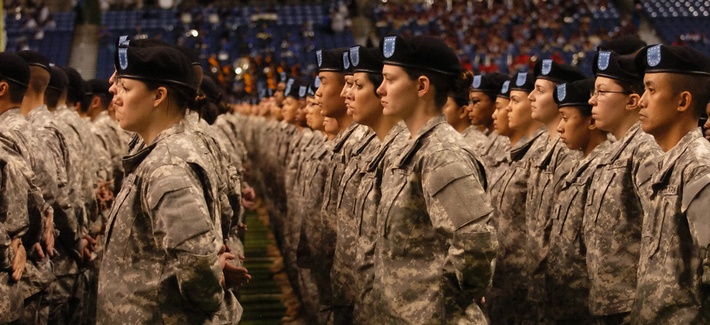 New soldiers take the oath of enlistment during a ceremony at the Alamodome in San Antonio, Texas. New soldiers take the oath of enlistment during a ceremony at the Alamodome in San Antonio, Texas.
