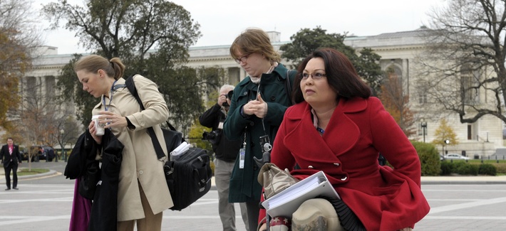 Rep. Tammy Duckworth, D-Ill., an Iraq War veteran who lost both legs in combat before turning to politics, arrives for a group photo on the East steps of the Capitol in Washington, Thursday, Nov. 15, 2012. (AP Photo/Susan Walsh) Rep. Tammy Duckworth, D-Ill., an Iraq War veteran who lost both legs in combat before turning to politics, arrives for a group photo on the East steps of the Capitol in Washington, Thursday, Nov. 15, 2012. (AP Photo/Susan Walsh)