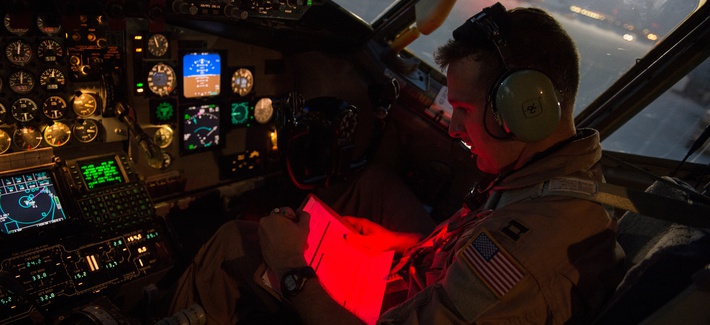 U.S. Air Force Capt. Trent Parker, 340th Expeditionary Air Refueling Squadron, KC-135 Stratotanker pilot, reads a pre-flight checklist prior to an in-air refueling mission over Iraq, Aug. 12, 2014. U.S. Air Force Capt. Trent Parker, 340th Expeditionary Air Refueling Squadron, KC-135 Stratotanker pilot, reads a pre-flight checklist prior to an in-air refueling mission over Iraq, Aug. 12, 2014.