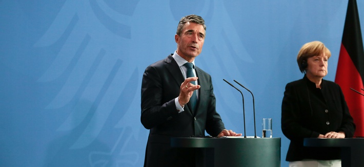 German Chancellor Angela Merkel, right, and NATO Secretary General Anders Fogh Rasmussen brief the media after a meeting at the chancellery in Berlin, Wednesday, July 2, 2014. German Chancellor Angela Merkel, right, and NATO Secretary General Anders Fogh Rasmussen brief the media after a meeting at the chancellery in Berlin, Wednesday, July 2, 2014.