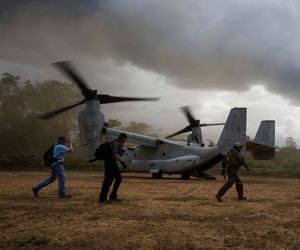 An MV-22 Osprey with the SPMAGTF Crisis Response - Africa, drops off supplies to support Operation United Assistance, in Fish Town, Liberia. An MV-22 Osprey with the SPMAGTF Crisis Response - Africa, drops off supplies to support Operation United Assistance, in Fish Town, Liberia.