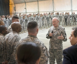 U.S. Chairman of the Joint Chiefs of Staff, Army Gen. Martin E. Dempsey addresses questions from U.S. military members during a town hall meeting in Baghdad, Iraq, Nov. 15, 2014. 