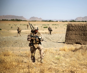 Cpl. Isaac Garcia patrols during a two-day mission in Larr Village, Afghanistan, May 22, 2014. Cpl. Isaac Garcia patrols during a two-day mission in Larr Village, Afghanistan, May 22, 2014.