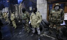 Volunteers of the Aidar battalion picket in front of the Ministry of Defense as they protest against a decision to change the leadership of the battalion in Kiev, Ukraine, Monday, Feb. 2, 2015.