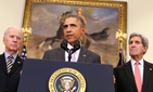 President Barack Obama, flanked by Vice President Joe Biden, left, and Secretary of State John Kerry, right, speaks about the Islamic State group in the Roosevelt Room of the White House in Washington, Feb. 11, 2015.