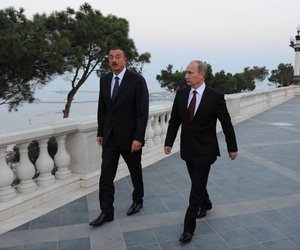 Russian President Vladimir Putin, right, walks with Azerbaijan's President Ilham Aliyev, on Aug. 13, 2013. Russian President Vladimir Putin, right, walks with Azerbaijan's President Ilham Aliyev, on Aug. 13, 2013.