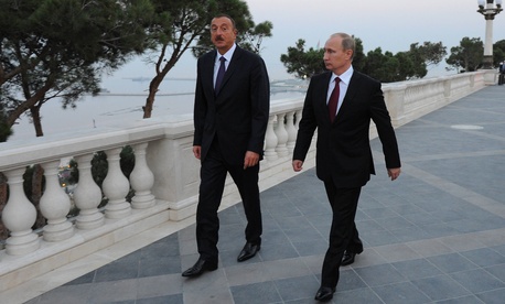 Russian President Vladimir Putin, right, walks with Azerbaijan's President Ilham Aliyev, on Aug. 13, 2013. Russian President Vladimir Putin, right, walks with Azerbaijan's President Ilham Aliyev, on Aug. 13, 2013.