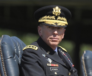 Then ISAF Commander Gen. David Petraeus participates in a retirement ceremony at Joint Base Myer-Henderson Hall in Arlington, VA, on Aug. 31. 2011.