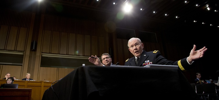 Gen. Martin Dempsey, alongside Defense Secretary Ash Carter, testifies in front of the Senate Armed Services Committee, on March 3, 2015.