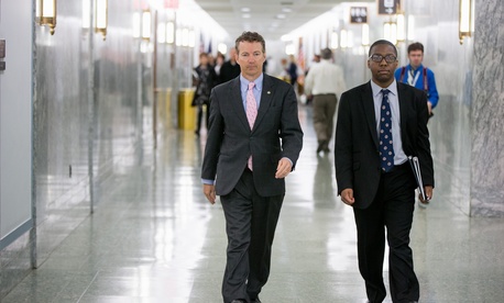 Republican Presidential candidate Sen. Rand Paul, R-Ky., center, walks on Capitol Hill in Washington, Wednesday, April 15, 2015. Republican Presidential candidate Sen. Rand Paul, R-Ky., center, walks on Capitol Hill in Washington, Wednesday, April 15, 2015.