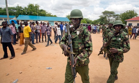 Kenya Defence Forces soldiers arrive at a hospital to escort the bodies of the attackers to be put on public view, in Garissa, Kenya, April 4, 2015.