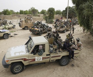 Chadian soldiers escorting a group of journalists ride on trucks and pickups in the city of Damasak, Nigeria, Wednesday March 18, 2015. Chadian soldiers escorting a group of journalists ride on trucks and pickups in the city of Damasak, Nigeria, Wednesday March 18, 2015.