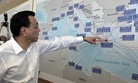 Chinese Prime Minister Li Keqiang looks at a map of the port of Piraeus, where Chinese shipping giant Cosco controls two of the three container terminals, on Friday June 20, 2014.