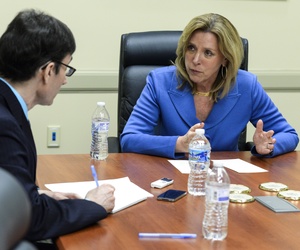 Secretary of the Air Force Deborah Lee James answers questions from local media during a visit to Wright-Patterson Air Force Base, Ohio, March 26, 2015. 