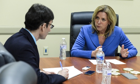 Secretary of the Air Force Deborah Lee James answers questions from local media during a visit to Wright-Patterson Air Force Base, Ohio, March 26, 2015. 