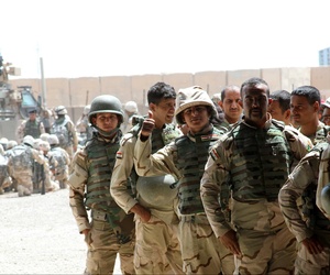 Soldiers from the 76th Iraqi Infantry Brigade receive M16A2 rifles and infantry sets as part of the fielding of combat brigade sets supplied to Iraqi Security Forces May 25, 2015, at Camp Taji, Iraq, Soldiers from the 76th Iraqi Infantry Brigade receive M16A2 rifles and infantry sets as part of the fielding of combat brigade sets supplied to Iraqi Security Forces May 25, 2015, at Camp Taji, Iraq,