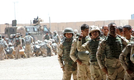 Soldiers from the 76th Iraqi Infantry Brigade receive M16A2 rifles and infantry sets as part of the fielding of combat brigade sets supplied to Iraqi Security Forces May 25, 2015, at Camp Taji, Iraq, Soldiers from the 76th Iraqi Infantry Brigade receive M16A2 rifles and infantry sets as part of the fielding of combat brigade sets supplied to Iraqi Security Forces May 25, 2015, at Camp Taji, Iraq,
