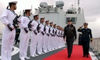 Chinese sailors render honors to Secretary of the Navy Ray Mabus in 2012.