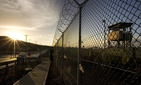 In this photo reviewed by the U.S. Military, the sun rises over Camp Delta detention compound at Guantanamo Bay U.S. Naval Base, in Cuba. In this photo reviewed by the U.S. Military, the sun rises over Camp Delta detention compound at Guantanamo Bay U.S. Naval Base, in Cuba.