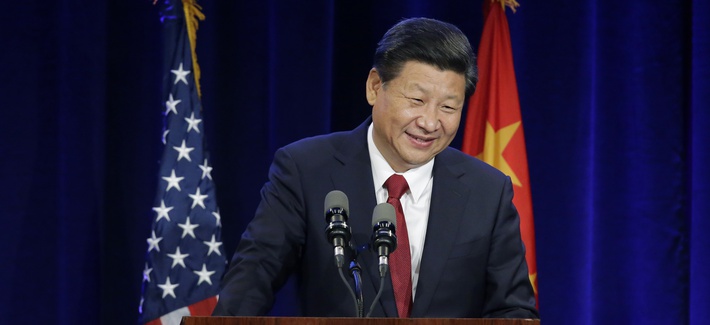 On his way to Washington, Chinese President Xi Jinping speaks Tuesday, Sept. 22, 2015, in Seattle. 