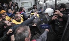 Protesters clash with police in Istanbul, Turkey, Tuesday, Oct. 13, 2015.