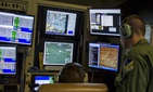 Student sensor operators from the 6th Reconnaissance Squadron practice tactical operations during an MQ-1 Predator simulator mission.