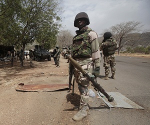 Nigerian soldiers man a checkpoint in Gwoza, Nigeria, a town newly liberated from Boko Haram, April 8, 2015. Nigerian soldiers man a checkpoint in Gwoza, Nigeria, a town newly liberated from Boko Haram, April 8, 2015.