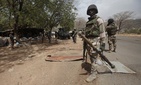 Nigerian soldiers man a checkpoint in Gwoza, Nigeria, a town newly liberated from Boko Haram, April 8, 2015. Nigerian soldiers man a checkpoint in Gwoza, Nigeria, a town newly liberated from Boko Haram, April 8, 2015.