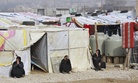 Syrian refugees women sitting outside their tents, during the visit of Filippo Grandi, the United Nations High Commissioner for Refugees, UNHCR, to a camp in the town of Saadnayel.