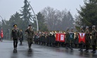Chairman of the U.S. Joint Chiefs of Staff, Gen. Joseph Dunford, second left, and Turkey's Chief of Staff Gen. Hulusi Akar inspect a military honour guard in Ankara, Turkey, on Jan. 6, 2016.