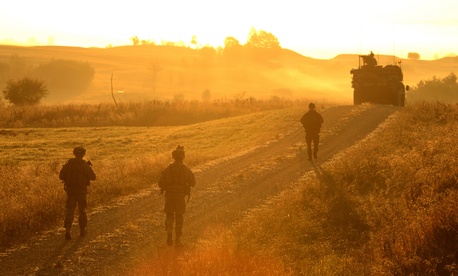 U.S. Army soldiers from the 2nd Cavalry Regiment, patrol a road at the Grafenwoehr Training Area during Exercise Saber Junction 12 in 2012. U.S. Army soldiers from the 2nd Cavalry Regiment, patrol a road at the Grafenwoehr Training Area during Exercise Saber Junction 12 in 2012.
