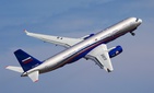 Russia's Tu-214ON Open Skies aircraft flies at the MAKS-2011 airshow outside Moscow.