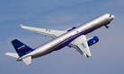 Russia's Tu-214ON Open Skies aircraft flies at the MAKS-2011 airshow outside Moscow.