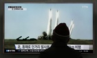 A man watches a TV screen showing a file footage of the missile launch conducted by North Korea, at Seoul Railway Station in Seoul, South Korea, Monday, March 21, 2016. North Korea fired short-range projectiles into the sea on Monday, Seoul said.