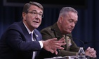 Defense Secretary Ash Carter, accompanied by Joint Chiefs Chairman Gen. Joseph Dunford, speaks during a news conference at the Pentagon, Friday, March 25, 2016. Defense Secretary Ash Carter, accompanied by Joint Chiefs Chairman Gen. Joseph Dunford, speaks during a news conference at the Pentagon, Friday, March 25, 2016.