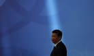 Chinese President Xi Jinping waits for leaders to arrive before a ceremony in Shanghai Wednesday, May 21, 2014.