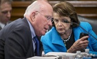 Sen. Patrick Leahy, D-Vt., the ranking member of the Senate Judiciary Committee, left, speaks with Sen. Dianne Feinstein, D-Calif., on Capitol Hill in Washington, March 10, 2016. 