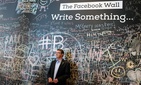 Defense Secretary Ash Carter stands in front of the Facebook wall during his visit to the company’s headquarters in Menlo Park, Calif., April 23, 2015.