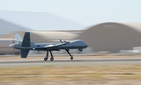 An MQ‐9 Reaper flies from the Southern California Logistics Airport in Victorville, Calif., July 30, 2014