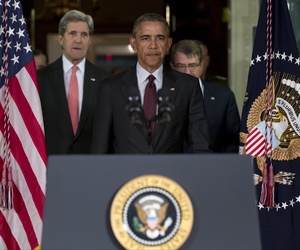 President Barack Obama emerges from a National Security Council meeting at the State Dept., Feb. 2016, with Secretary of State John Kerry, left, Defense Secretary Ash Carter, right, and Joint Chiefs Chairman Gen. Joseph Dunford.