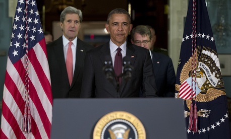 President Barack Obama emerges from a National Security Council meeting at the State Dept., Feb. 2016, with Secretary of State John Kerry, left, Defense Secretary Ash Carter, right, and Joint Chiefs Chairman Gen. Joseph Dunford.