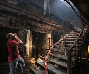 In this Sunday July 3, 2016, file photo, an Iraqi man looks for victims at the site of a deadly truck bomb attack in a commercial area of the Karada neighborhood, Baghdad, Iraq. In this Sunday July 3, 2016, file photo, an Iraqi man looks for victims at the site of a deadly truck bomb attack in a commercial area of the Karada neighborhood, Baghdad, Iraq.