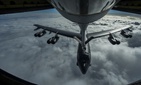 A B-52 Stratofortress is refueled in flight on April 2, 2014 over the Pacific Ocean near Joint Base Pearl Harbor-Hickam, Hawaii. A B-52 Stratofortress is refueled in flight on April 2, 2014 over the Pacific Ocean near Joint Base Pearl Harbor-Hickam, Hawaii.