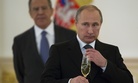 In a file photo from 2014, Russian President Vladimir Putin prepares to toast with ambassadors in the Grand Kremlin Palace in Moscow, Russia.