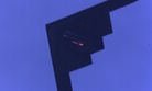 A B-2 stealth bomber drops an inert B61 nuclear bomb.