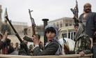 Tribesmen loyal to Houthi rebels hold their weapons as they ride on the back of a truck during a gathering aimed at mobilizing more fighters into battlefronts in several Yemeni cities, in Sanaa, Yemen, Thursday, Nov. 10, 2016.