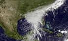 This satellite image taken Tuesday, June 20, 2017, and released by the National Oceanic and Atmospheric Administration shows a tropical storm over the Gulf of Mexico approaching the Gulf Coast. 