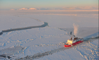 The Kigluaik Mountains are visible as the Coast Guard Cutter Healy breaks ice for the Russian tanker Renda near Nome Jan. 13, 2012.