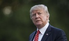 President Donald Trump walks from Marine One across the South Lawn of the White House in Washington, Aug. 23, 2017.